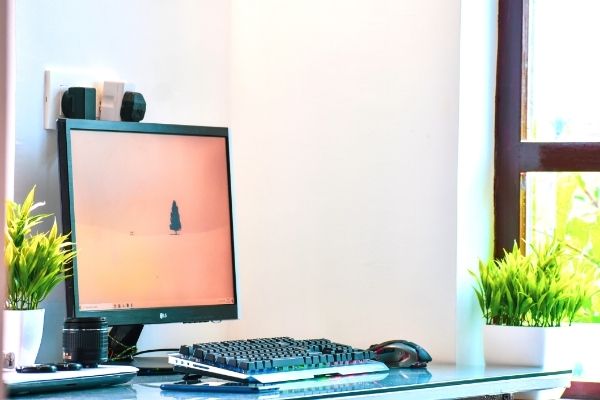 an organized desk with a clean and neat desktop screen