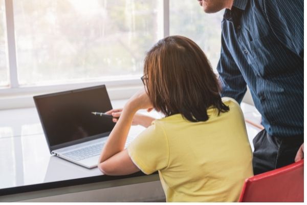 co-workers-looking at laptop