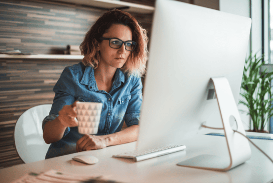 Woman reading how to protect her datra on computer